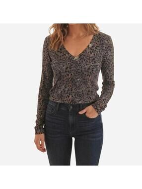 Monoprix Femme features a stylish, multi-tonal animal print pattern.